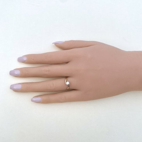 9ct. Gold Diamond Solitaire Crossover Ring.
