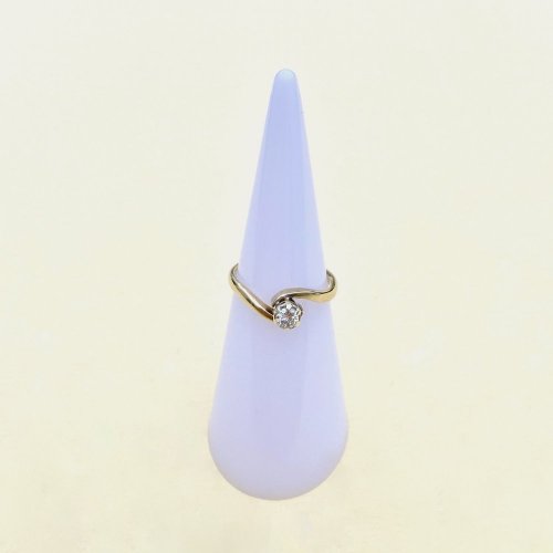 9ct. Gold Diamond Solitaire Crossover Ring.