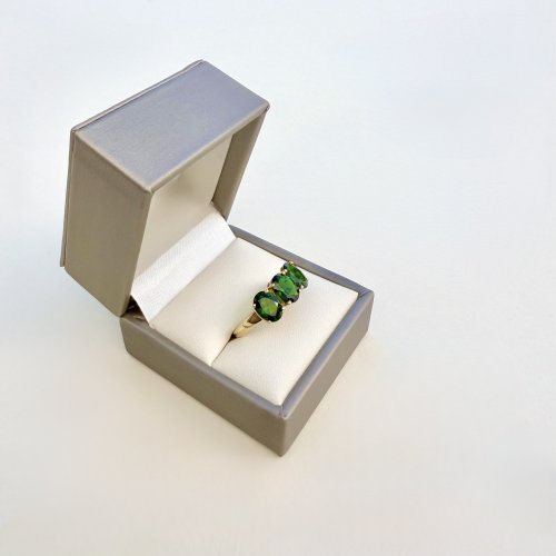 10ct. Gold Ring set with Three Green Diopside Gemstones.