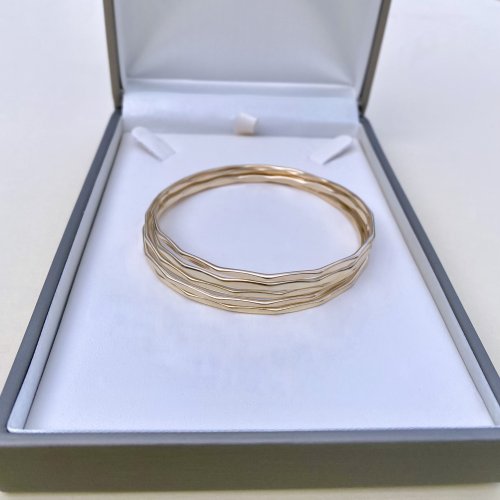 Set of Five 9ct. Yellow Gold Bangles. SOLD.