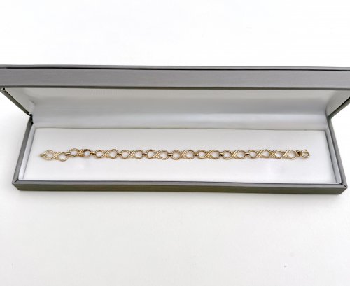9ct. Gold Figure-of-Eight Eternity Bracelet. NEW STOCK.