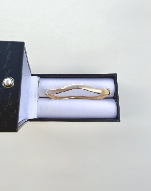 Contemporary 9ct. Yellow Gold Wave Bangle. NEW STOCK. SOLD. 