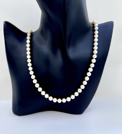 Single-Row 19" Necklace of Cultured Pearls with 9ct. Gold Clasp.