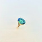 9ct. Solid Gold Ring with Vibrant Green  Faceted Stone.