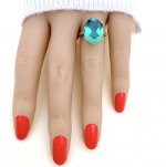 9ct. Solid Gold Ring with Vibrant Green  Faceted Stone.