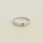 18ct. White Gold Channel Set Single Diamond Ring.
