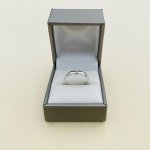 18ct. White Gold Channel Set Single Diamond Ring.