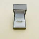 18ct. White Gold Channel Set Single Diamond Ring.
