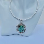 Handcrafted Silver Pendant / Oval Turquoise stone to centre.