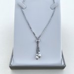 Silver Necklace Suspending Double Pearls.