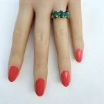 10ct. Gold Ring set with Three Green Diopside Gemstones.