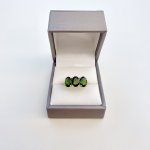 10ct. Gold Ring set with Three Green Diopside Gemstones.