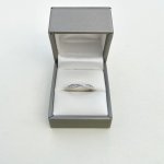 9ct. White Gold Diamond ½ Eternity Style Twist Ring. 